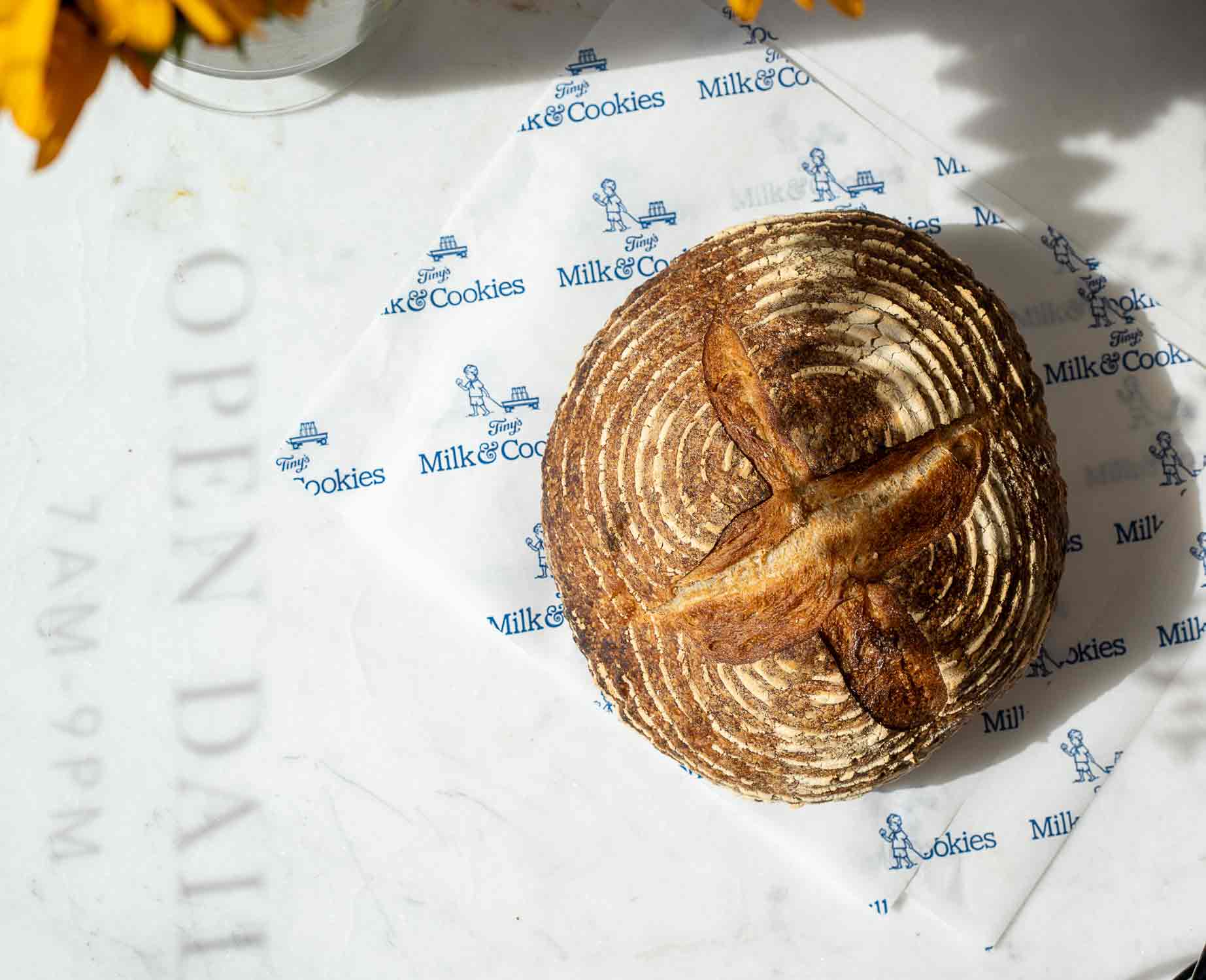 Sourdough bread on deli paper
